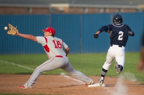 Belton's Reece Hohhertz, catches a ball just before Burt Cruz hits first base at Shoemaker High School.